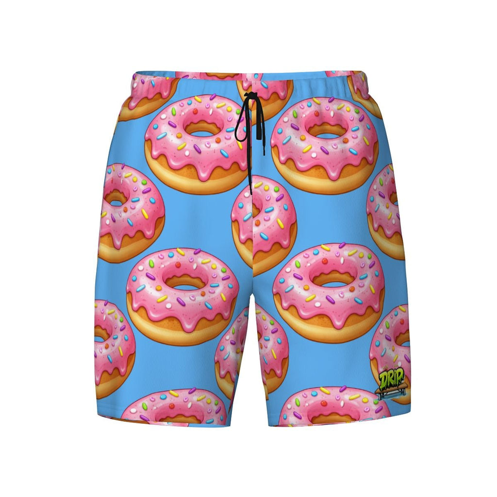Beach shorts with pink donut pattern on a blue background