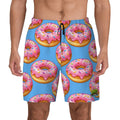 Blue swim shorts with pink donut pattern on a white background